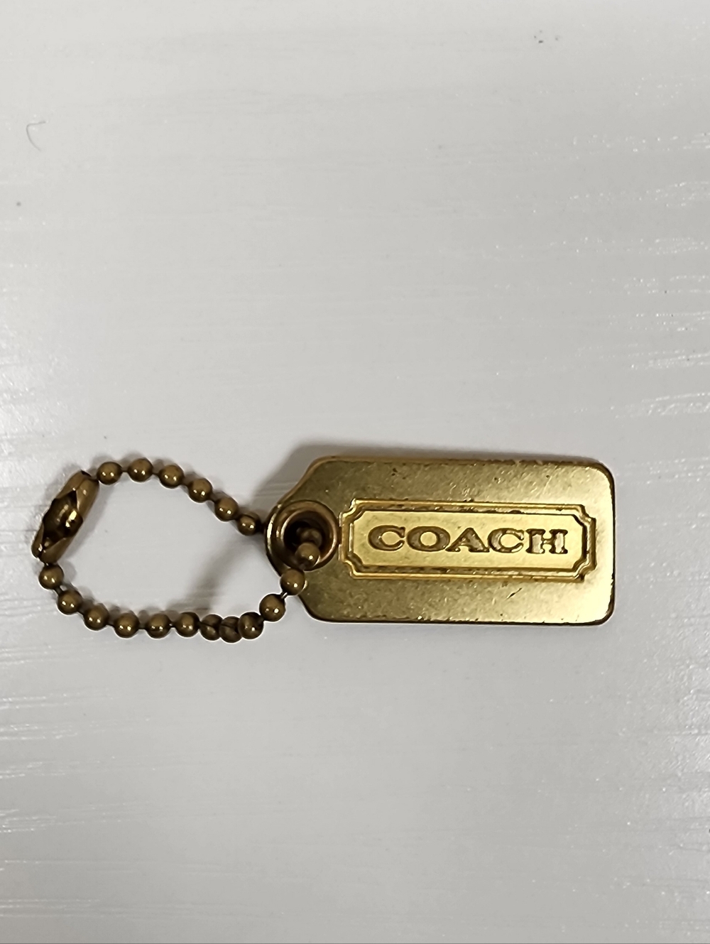 Coach Mini Brass Hangtag